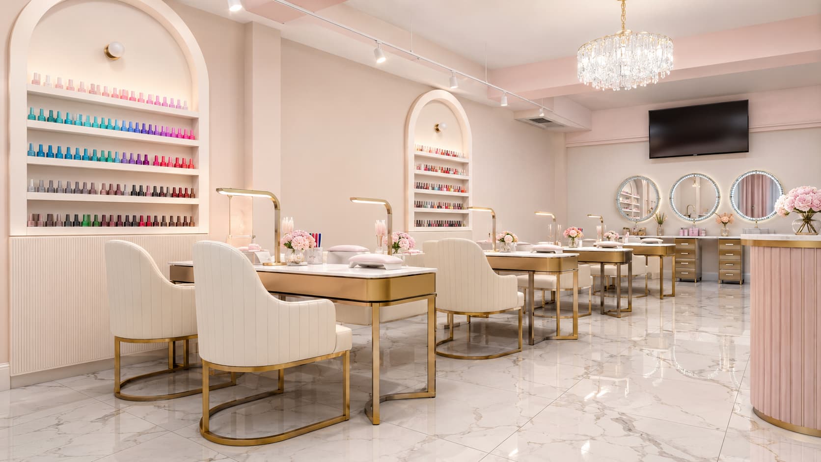 Pink and champagne nail salon interior with manicure stations